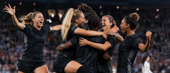 Sports team celebrating together
